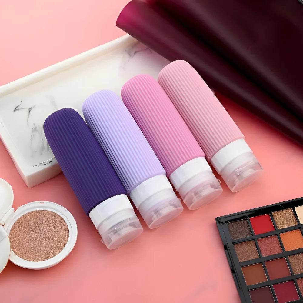 Reiseflaschen Set 4×90 ml mit transparentem Kulturbeutel – auslaufsichere Silikonflaschen zum Nachfüllen für Shampoo Duschgel & Lotion