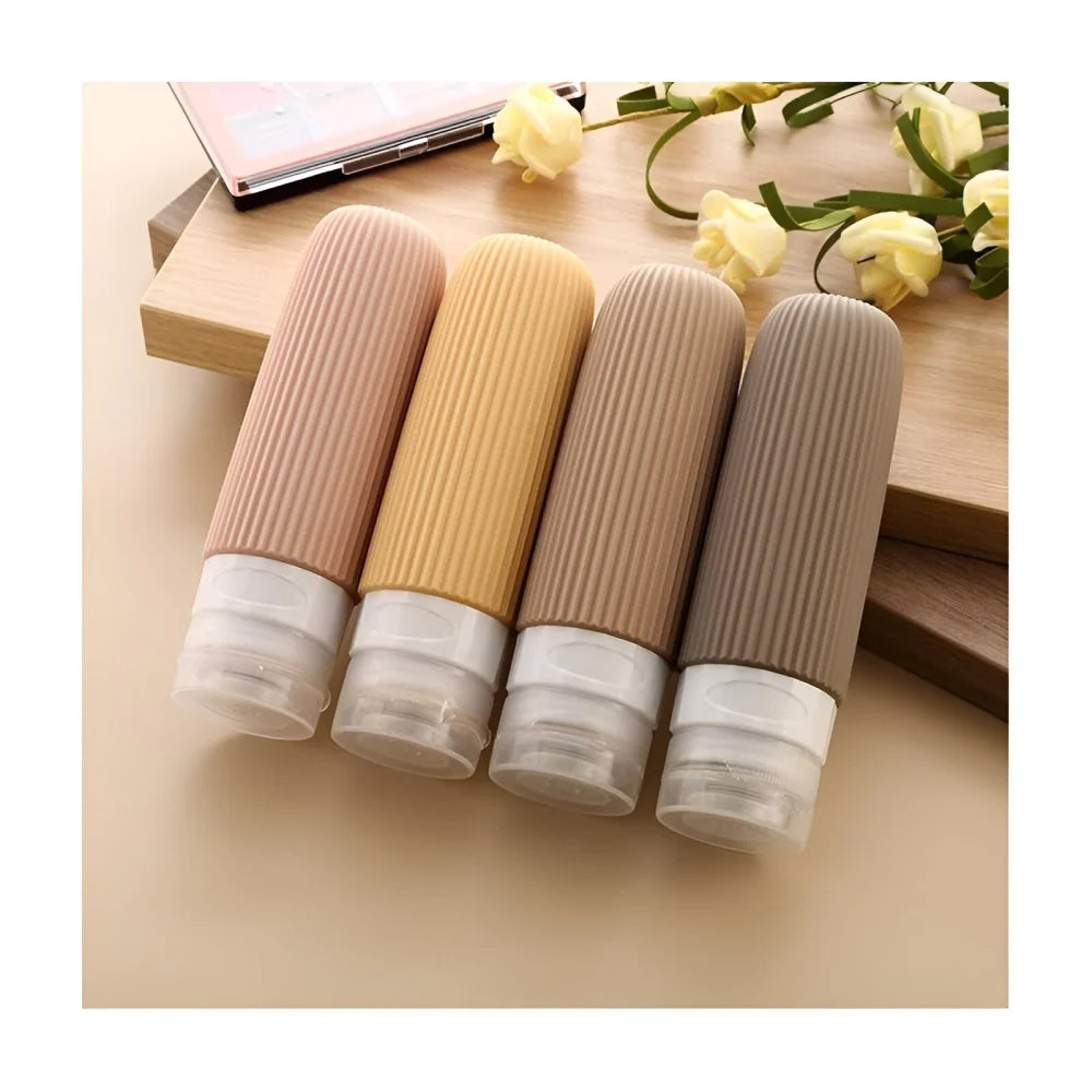 Reiseflaschen Set 4×90 ml mit transparentem Kulturbeutel – auslaufsichere Silikonflaschen zum Nachfüllen für Shampoo Duschgel & Lotion