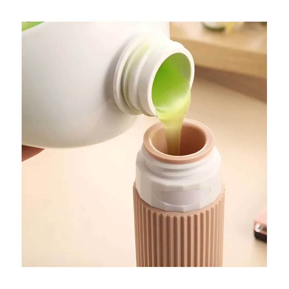 Reiseflaschen Set 4×90 ml mit transparentem Kulturbeutel – auslaufsichere Silikonflaschen zum Nachfüllen für Shampoo Duschgel & Lotion