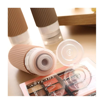 Reiseflaschen Set 4×90 ml mit transparentem Kulturbeutel – auslaufsichere Silikonflaschen zum Nachfüllen für Shampoo Duschgel & Lotion