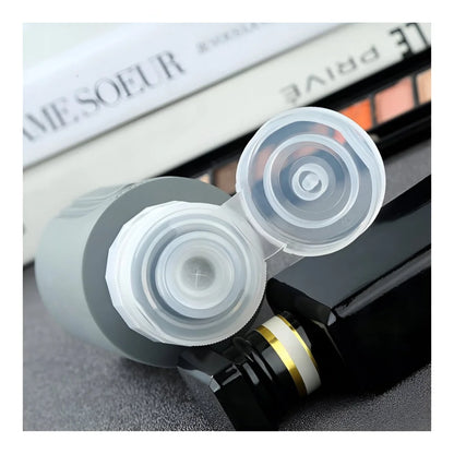 Reiseflaschen Set 4×90 ml mit transparentem Kulturbeutel – auslaufsichere Silikonflaschen zum Nachfüllen für Shampoo Duschgel & Lotion