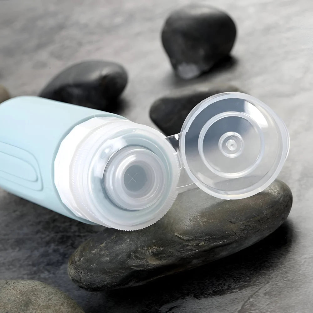 Reiseflaschen Set 4×90 ml mit transparentem Kulturbeutel – auslaufsichere Silikonflaschen zum Nachfüllen für Shampoo Duschgel & Lotion